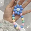 Cadena para teléfono móvil con cuentas de niña linda, cordón, flor acrílica, lazo, corazón con cuentas, funda de teléfono, adornos de cuentas de colores
