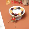 Pulsera Artesanal de Madera con Semillas de Cascabel, Cascabel de Agitar a Mano, Carrillón de Viento de Cáscara de Fruta de los Deseos, Colgante para Bolso, Llavero para Teléfono