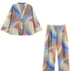 Roupas femininas europeias e americanas transfronteiriças, top listrado casual da moda mais vendido no AliExpress com detalhe de nó + calça de perna reta