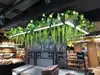 Ramas de flor de cerezo flor de durazno falsa plantas verdes de techo decoración enredaderas de flores de interior pared de celebridad de internet supermercado restaurante habitación cubierta superior fealdad
