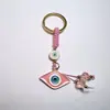 Colgante de Serie Ojo de Diablo Transfronterizo Europeo y Americano Colgante de Llavero de Joyería de Animales Ojo de Hueso con Goteo de Aceite Accesorios de Aleación para Mujeres