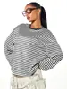 Camiseta listrada color block de manga comprida, best-seller transfronteiriça europeia e americana para mulheres, gola redonda, ombro caído, corte solto, estilo curto, top básico casual