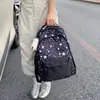 Nova mochila transfronteiriça de alta moda com estampa de estrelas para estudantes do ensino fundamental II, estilo coreano moderno, grande capacidade, leve e confortável