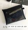 Bolsa de cosméticos de malla al por mayor de fábrica, bolsa de almacenamiento con colchón de aire para lápiz labial de tamaño pequeño, bolsa de maquillaje negra portátil de gran capacidad