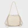 Bolsa Tejida Nueva de Verano 2025 Bolso de Hombro Cruzado Tejido a Mano de PU Bolsa de Axila de Venta Caliente para Mujer Bolso de Celebridad de Internet