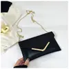 Bolso de mano de moda europeo y americano, nuevo estilo versátil de hombro y cruzado para chicas a la moda, bolso de sobre de cadena vintage de alta gama para la noche