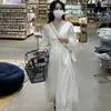 Vestido de Outono 2026 Novo Estilo Palácio Decote V Manga Longa, Estilo Francês, Muito Elegante, Vestido Emagrecedor na Cintura para Mulheres
