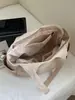Bolsa de Lona Bolso Tote para Mujer Gran Capacidad 2026 Estilo Nuevo Bolso de Moda para Mujer para el Trabajo y los Viajes Bolso de Alta Gama para Mujer