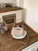 Bolsa de mão feminina de luxo 2026 nova tendência moda primavera bolsa de ombro versátil requintada bolsa tiracolo tipo balde
