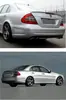Adecuado para 06-09 Mercedes-Benz Clase E Ensamblaje de Parachoques Delantero y Trasero de Gran Envolvente W211 Modificado E63Amg Kit de Gran Envolvente