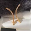 Nuevos Pendientes de Estrella de Cuatro Puntas con Circonita y Brillantes Completos para Mujer, Diseño de Nicho, Gama Alta, Versátiles y Exquisitos Pendientes de Media Luna para Mujer