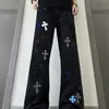 Jeans negros rotos y adornados con pedrería, con estampado de cruces para hombre, de pierna recta modernos, ligeramente acampanados, largos, rotos y adornados con pedrería