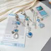 Pingente de Coração Flor com Glitter Azul Laço para Bolsa Chaveiro de Celular Pingente Pequeno Presente Exquisito