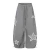 Jia Yi Ku 2026 Nuevos Pantalones Deportivos Retro Americanos de Retazos Bordados con Lunares y Dobladillo Curvo Unisex Sueltos de Pierna Ancha para Hombres y Mujeres