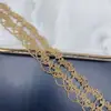Accesorios de Ropa al por Mayor Producto Nuevo Hilo Dorado en Stock Cinta Tejida Usable Código de Barras Encaje Bordado Encaje Dorado de Doble Cara
