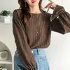 Los estilos japonés y coreano, populares en el sudeste asiático, son tops de gasa de primavera de gran venta, camisas de aire acondicionado, tops de encaje y blusas.