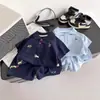 Conjunto de Camisa Polo de Color Sólido con Dibujos Animados para Niños Verano 2026, Conjunto de Dos Piezas de Moda de Verano Elegante para Bebés Niños