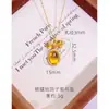 Collar de Latón Chapado en Oro con Lazo Huevo de Paloma, Lujo Ligero, Sencillo y Versátil, Cadena para Clavícula con Colgante Redondo de Princesa Fugitiva
