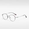 T23820 Estilo celebridad de internet retro artístico ligero semi-titanio gafas lisas montura ovalada moderna gafas ópticas con miopía