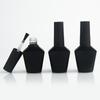 Venta al por mayor de fábrica Nuevo frasco vacío de esmalte de uñas de 13 ml punto negro y blanco frasco de esmalte de uñas capa de sellado inferior de pegamento pegamento dividido frasco vacío