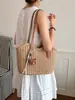 Bolso de paja con borlas transfronterizo, nuevo bolso tejido de paja, bolso de playa para vacaciones, bolso de hombro versátil, bolso tote de verano para el día a día