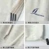 Calça Jogger Casual Solta da Marca da Moda para Homens, Estilo Primavera com Listras Coloridas nas Laterais, Punhos Ajustáveis, Calça Esportiva