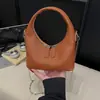 Bolsa de Dumpling Portátil de Nicho Transfronteiriça para Mulheres 2025 Nova Versátil Bolsa de Axila Simples e Estilosa Bolsa Transversal com Alça de Corrente