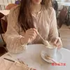 Camisa de gasa floral de moda con mangas largas, estilo vintage de Hong Kong para principios de otoño, blusa dulce holgada con mangas abullonadas, top elegante para mujer