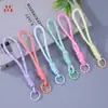 Nuevo cordón tejido de colores con encaje anudado, correa de muñeca anti-pérdida para teléfonos móviles, accesorio de llavero de muñeca hecho a mano