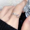 Anillo abierto de esmalte de goteo de alta calidad, de lujo, con luz blanca, apilado en un estilo frío, anillo de diseño de nicho de estilo coreano.