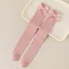 Calcetines para niñas con lazos, calcetines de tubo alto, nuevo estilo primavera y otoño 2026, hasta la rodilla, lindos, color liso, calcetines de algodón para niños para niñas, venta al por mayor