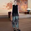 Nuevo traje de moda estilo chino para mujer, nuevo estilo de verano 2026, elegante camisa sin mangas abotonada y pantalones de pierna ancha estampados conjunto de dos piezas