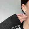 Pendientes de estilo coreano exquisitos del Joker geométricos de amor de cinco puntas personalidad europea y americana diseño dulce pendientes explosivos del Joker