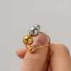 Anillo Geométrico Silencioso Europeo y Americano de Acero Inoxidable Oro 18K Tamaño Dorado Anillo de Bola Joyería Versátil de Acero Inoxidable Venta al por Mayor