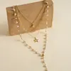Collar de perlas en capas con cuentas transfronterizo europeo y americano, cadena para la clavícula estilo fiesta vintage, lujo ligero, accesorio versátil de alta gama para mujer