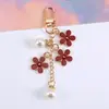 Chaveiro Pingente de Flor Colorida com Gotejamento de Óleo Dupla Face Transfronteiriço Acessórios de Liga de Zinco Pérola Decoração para Case de Fone de Ouvido Bolsa