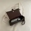 Moda Nova Outono 2026 Elegante Minimalista Bolsa Baguete Nicho Casual Feminina Transversal Ombro Crossbody
