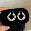 Elegante HerederaEstilo Fresco Bolso de Lunares Plateados Arete Arete Único Mujer 2026 Aretes Súper Hermosos