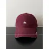 Gorra de béisbol bordada con letras de marca coreana de nicho de moda 2026 para mujer, estilo callejero versátil, gorra de béisbol adelgazante para hombre