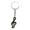 Festival de Música Nota Musical Creativa Forma de Guitarra Llavero Colgante Plástico Blando PVC Colgante para Mochila Escolar Disponible en Stock Mayoreo
