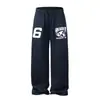 Pantalones de chándal hip-hop modernos estilo americano para hombres y mujeres, pantalones casuales estampados de alta calle para primavera, pantalones de pierna ancha deportivos para danza jazz