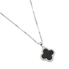 Collar de trébol de cuatro hojas para mujer, cadena de clavícula de nicho de lujo, elegante y simple, colgante combinable, joyería del mismo estilo.