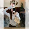 Camisa base elegante de color liso con ribete de volantes, corte ajustado para mujer, nueva colección de punto casual versátil de manga larga para la primavera de 2025