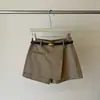 Saia assimétrica de cintura alta slim fit estilo coreano 2026 outono saia-calça versátil em A para o trabalho