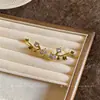 Pendientes de botón redondos de circonita chapados en oro real de 14 quilates, lujo ligero, alta gama, modernos y exquisitos, pendientes simples y versátiles para mujer