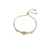 Pulsera Colgante Corazón de Circonita Bañada en Oro Real Estilo Coreano Pulsera Moderna Elegante Versátil Joyería de Mano de Alta Gama Personalizada para Mujeres