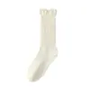 Calcetines con volantes para mujer, otoño e invierno, color liso, de media pantorrilla para estudiante, sencillos y versátiles, casuales, adecuados para combinar con zapatos pequeños de cuero, calcetines largos de algodón