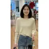 Top de punto asimétrico de dos piezas con mangas largas estilo francés para mujer, nueva colección principios de otoño 2026, top tipo chal de corte ajustado y que favorece la figura