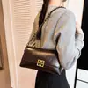 Bolso de Hombro tipo Silla Nuevo Retro Versátil Otoño e Invierno 2025 Diseño de Nicho Bolso Cruzado de Cadena de Moda Bolso de Viaje