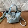 Transfronterizo 2026 Verano Nuevo Estilo Coreano Bolso de Mano Versátil de Gran Capacidad Casual para Viajes Diarios Bolso Cruzado de Hombro Tipo Cubo para Mujeres